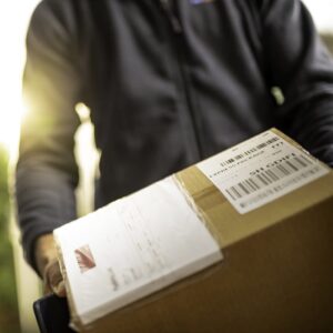 A parcel being delivered by a courier
